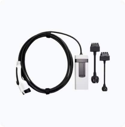 Electric vehicle wall charger with coiled cable on a white background.