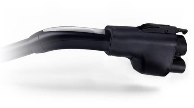 Close-up of an electric vehicle charging connector against a white background.