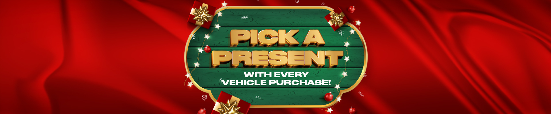 Holiday-themed banner with text "Pick a Present With Every Vehicle Purchase" on a red background.