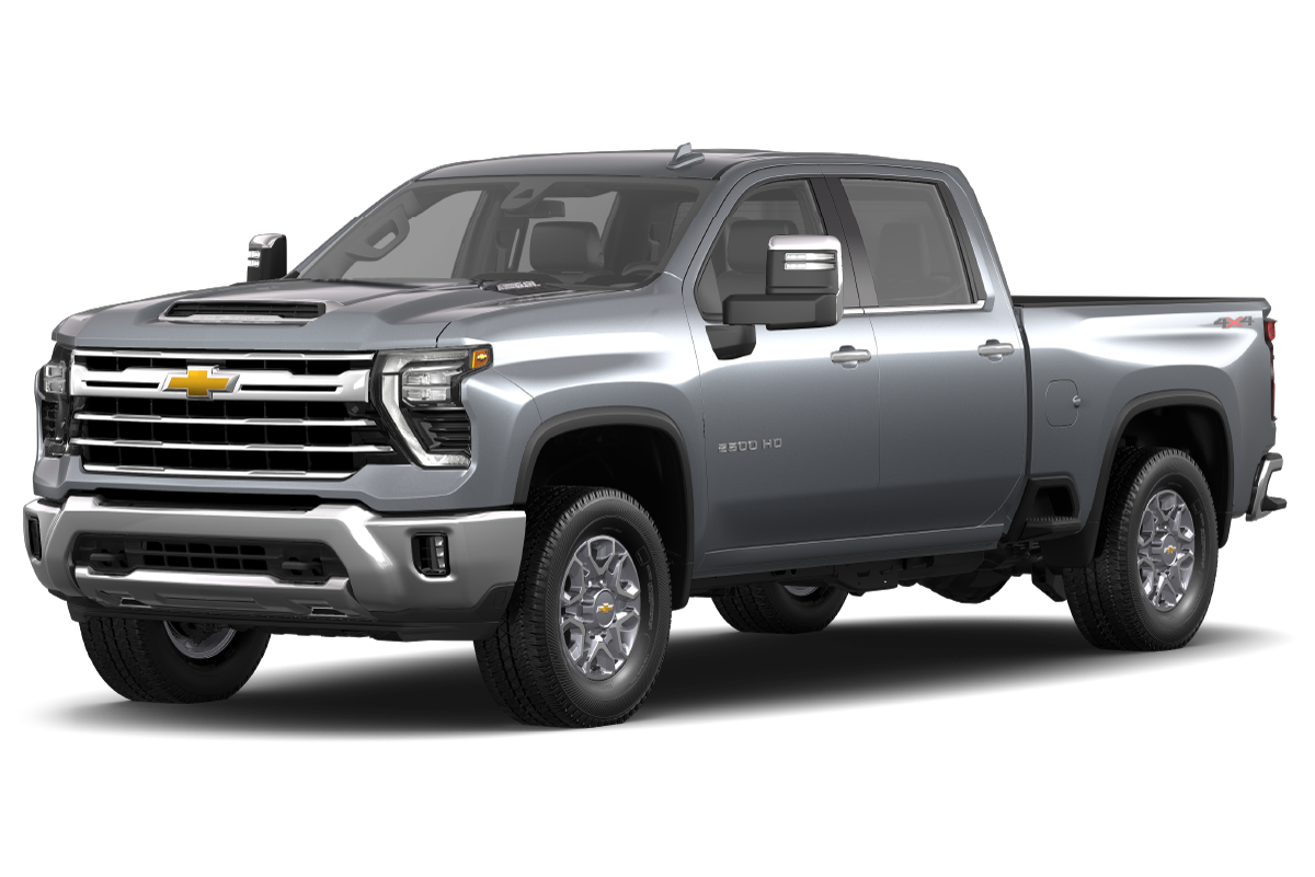Silver heavy-duty truck with a sleek design, front grille, and side mirrors.